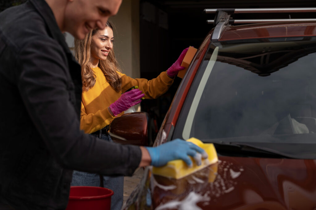 Team cleaning the car